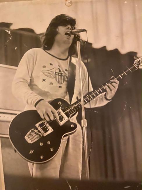 Andy playing his Jack Berry bass guitar